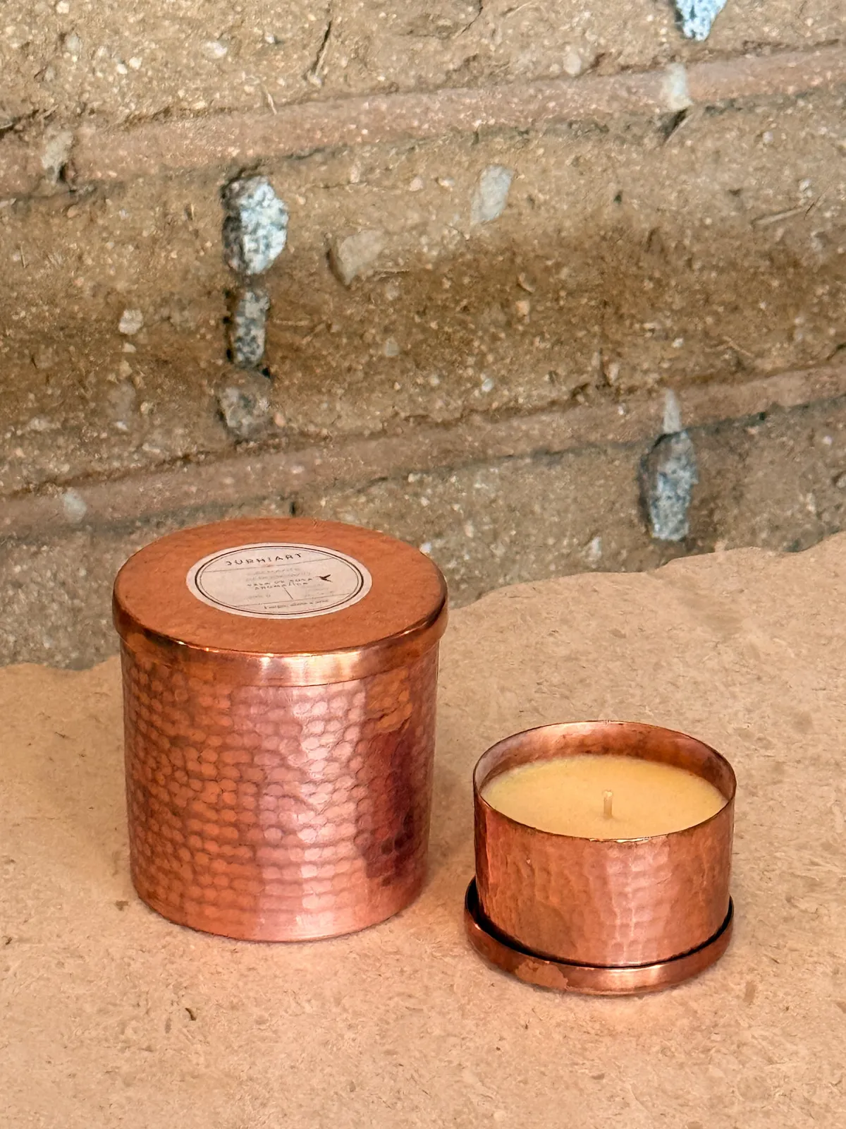 Aromatic Candle in Hammered Copper Pot – Aromatic soy candle in elegant hammered copper pot. Available in Red Fruits, Lavender & Ylang, and Coconut, Nard & Vanilla scents