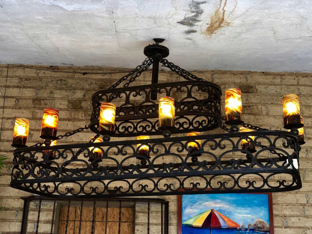 Candil de Fierro con Vidrio Soplado Large wrought iron rectangular chandelier with twelve orange and yellow handblown glass shades