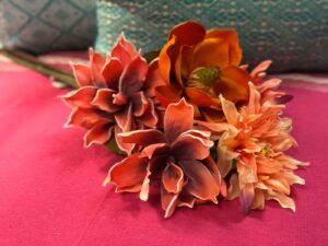 Bright orange faux flowers