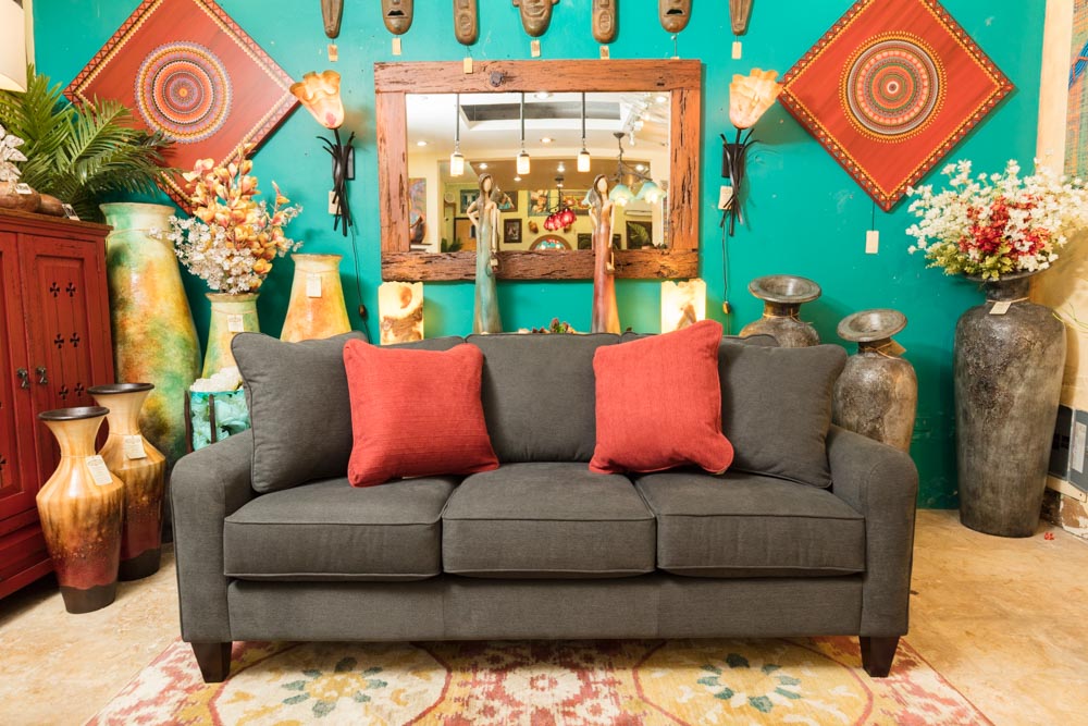 Dark gray LaZBoy talbot sofa in Cabo San Lucas Dark gray LaZBoy talbot sofa in Cabo San Lucas with red throw pillows
