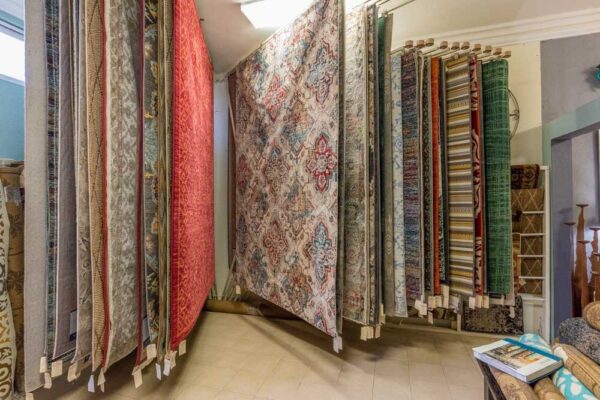 Large collection of rugs at furniture store in Cabo San Lucas