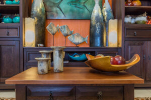 Wooden coffee table and buffet with clay sculptures, for sale in Cabo San Lucas