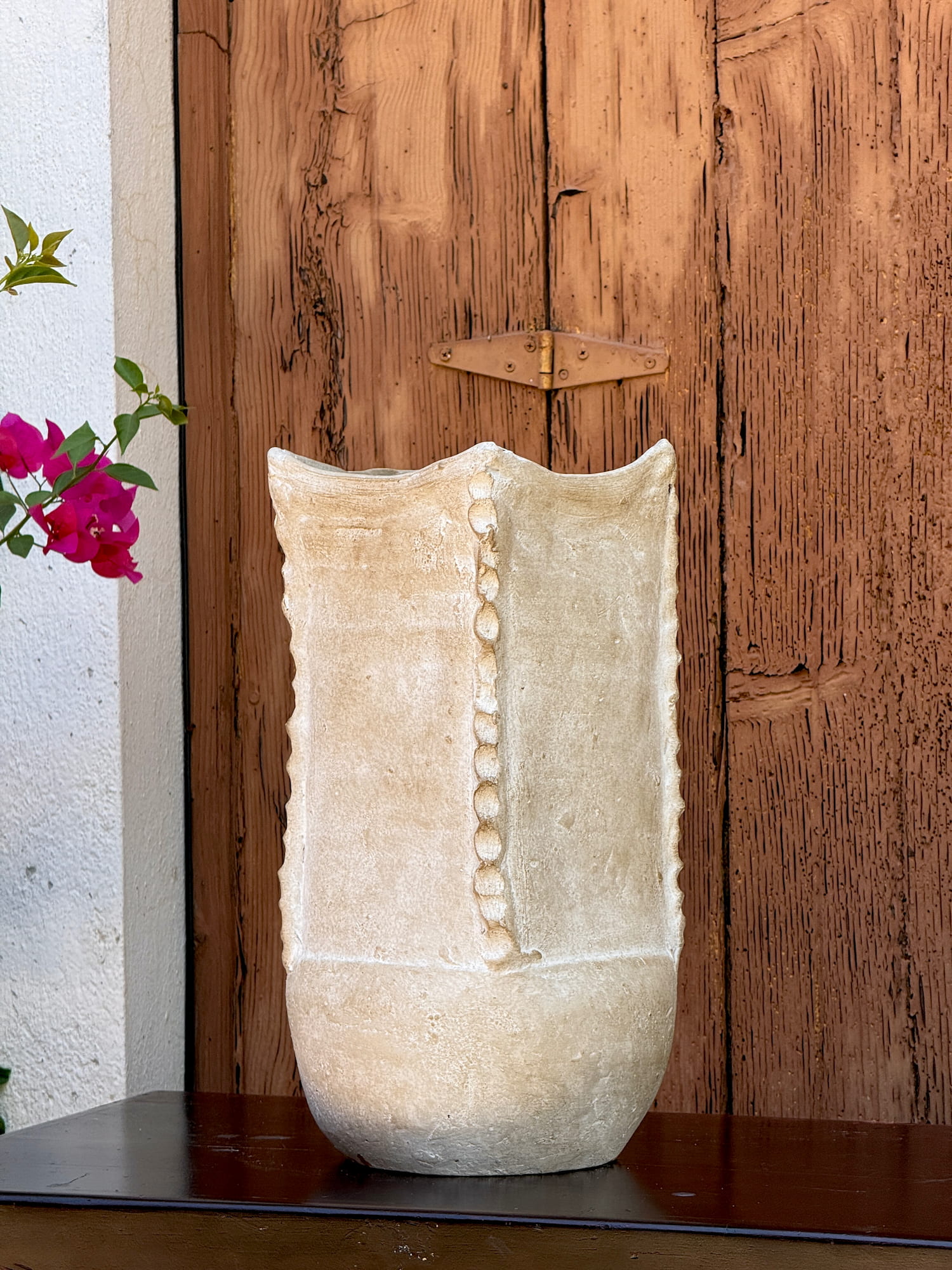 Clay vase with sandy weathered finish