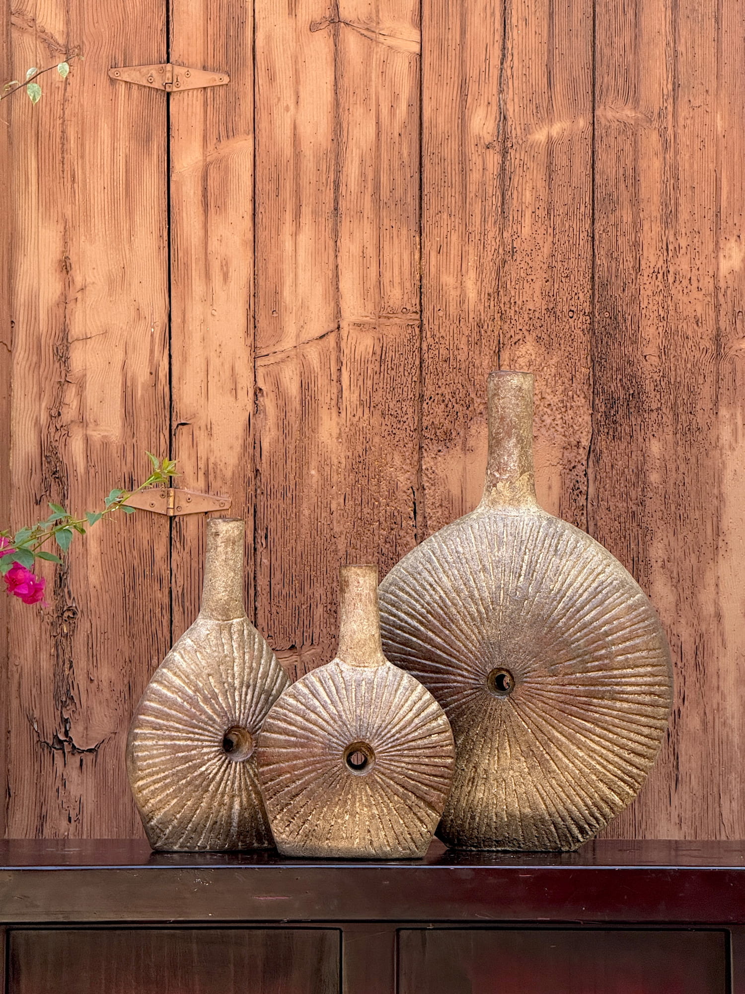 Decorative clay bottles with weathered finish